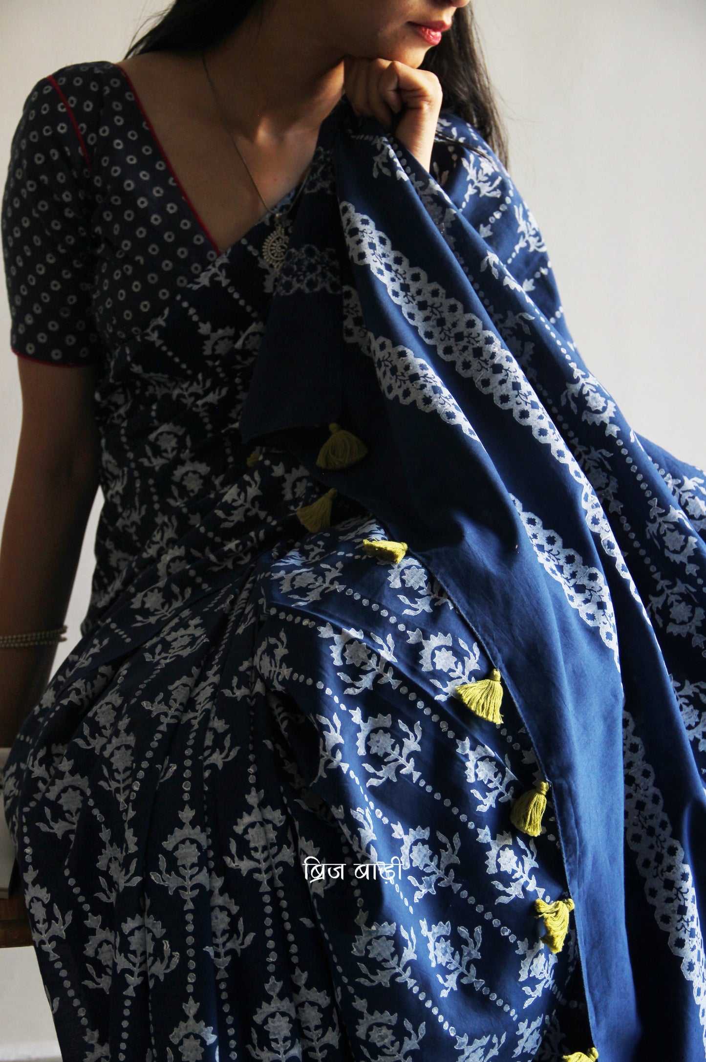 Blue hand block printed cotton saree with intricate motifs, lightweight and breathable fabric, includes a free matching blouse piece – perfect for everyday and festive wear.