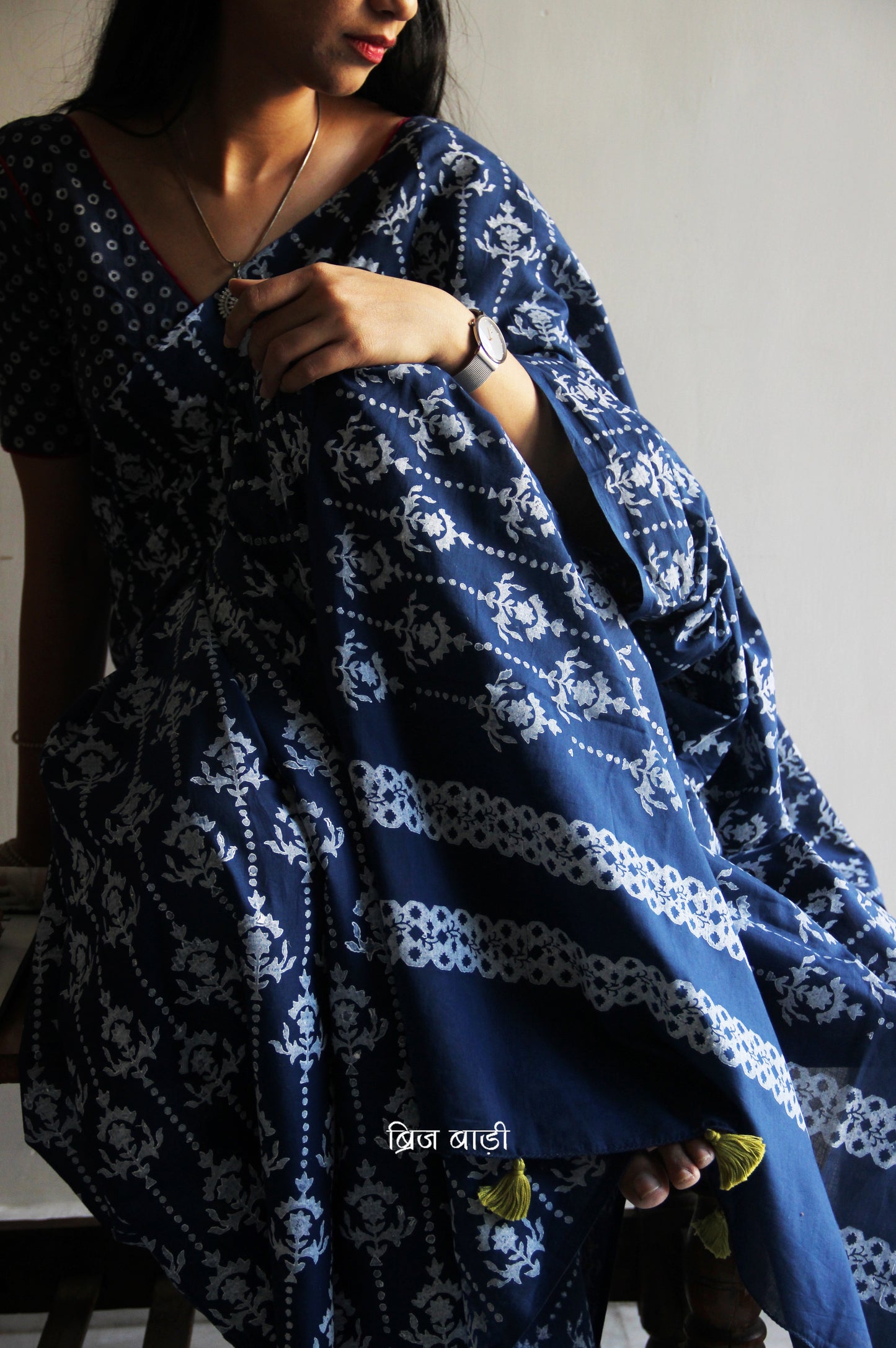 Blue hand block printed cotton saree with intricate motifs, lightweight and breathable fabric, includes a free matching blouse piece – perfect for everyday and festive wear.