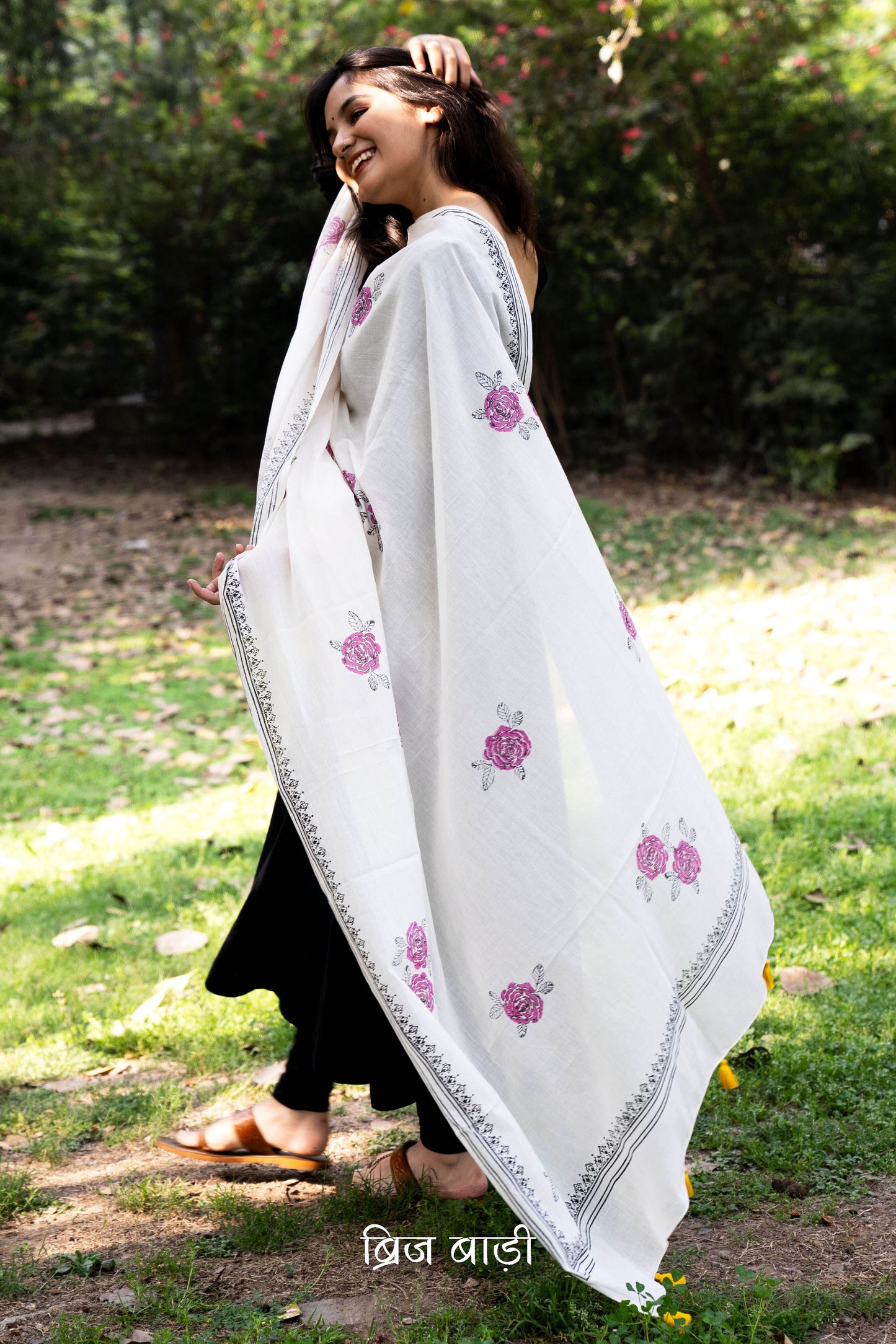 Off white soft and lightweight cotton dupatta by Brij Bari, hand block printed with charming floral motifs for an artisanal, handcrafted finish. Accented with light green handmade thread tassels on both ends of the pallu, this dupatta pairs beautifully with daily suits—adding an elegant touch and ensuring comfort for all-day wear. Free shipping pan India.