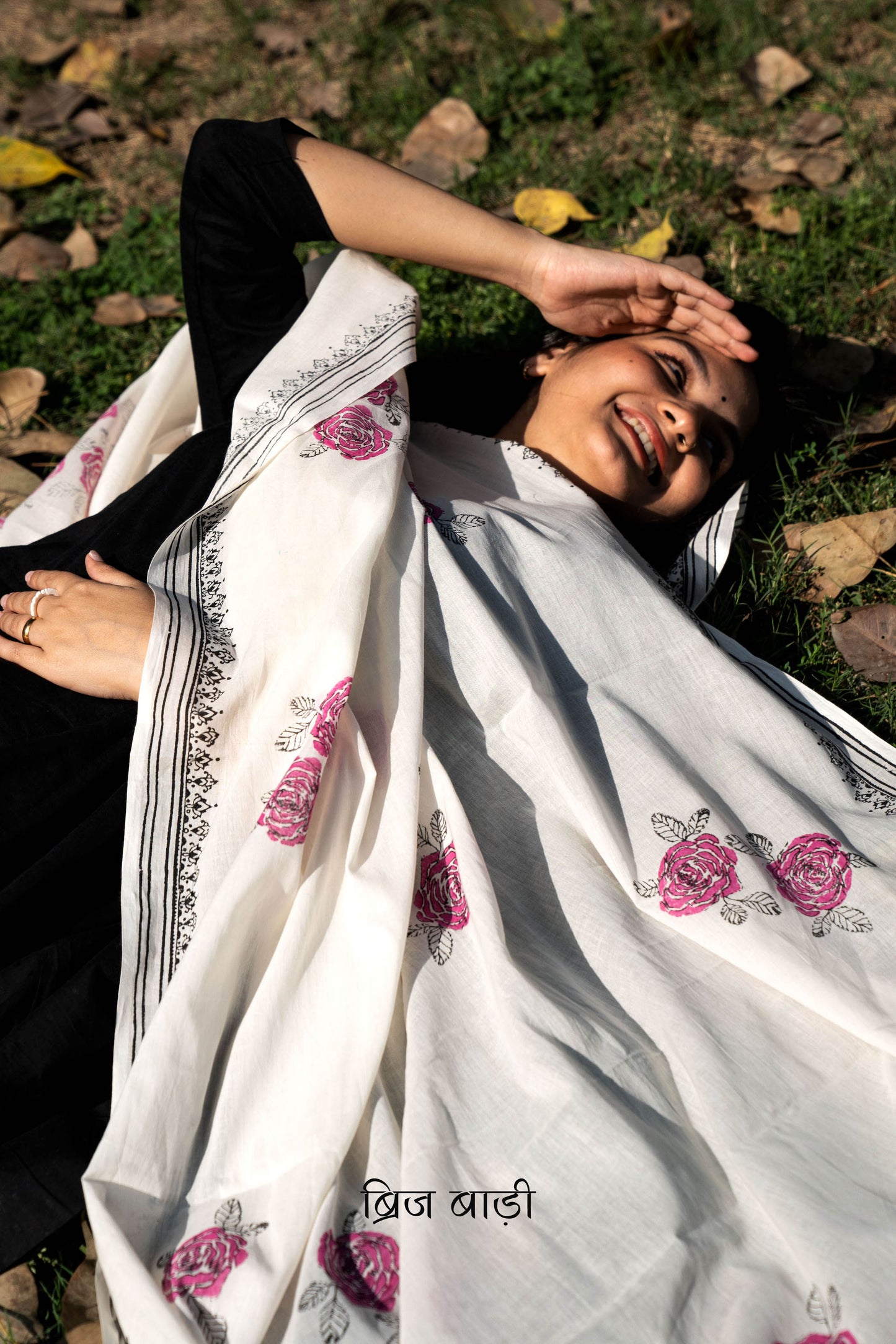 Off white soft and lightweight cotton dupatta by Brij Bari, hand block printed with charming floral motifs for an artisanal, handcrafted finish. Accented with light green handmade thread tassels on both ends of the pallu, this dupatta pairs beautifully with daily suits—adding an elegant touch and ensuring comfort for all-day wear. Free shipping pan India.
