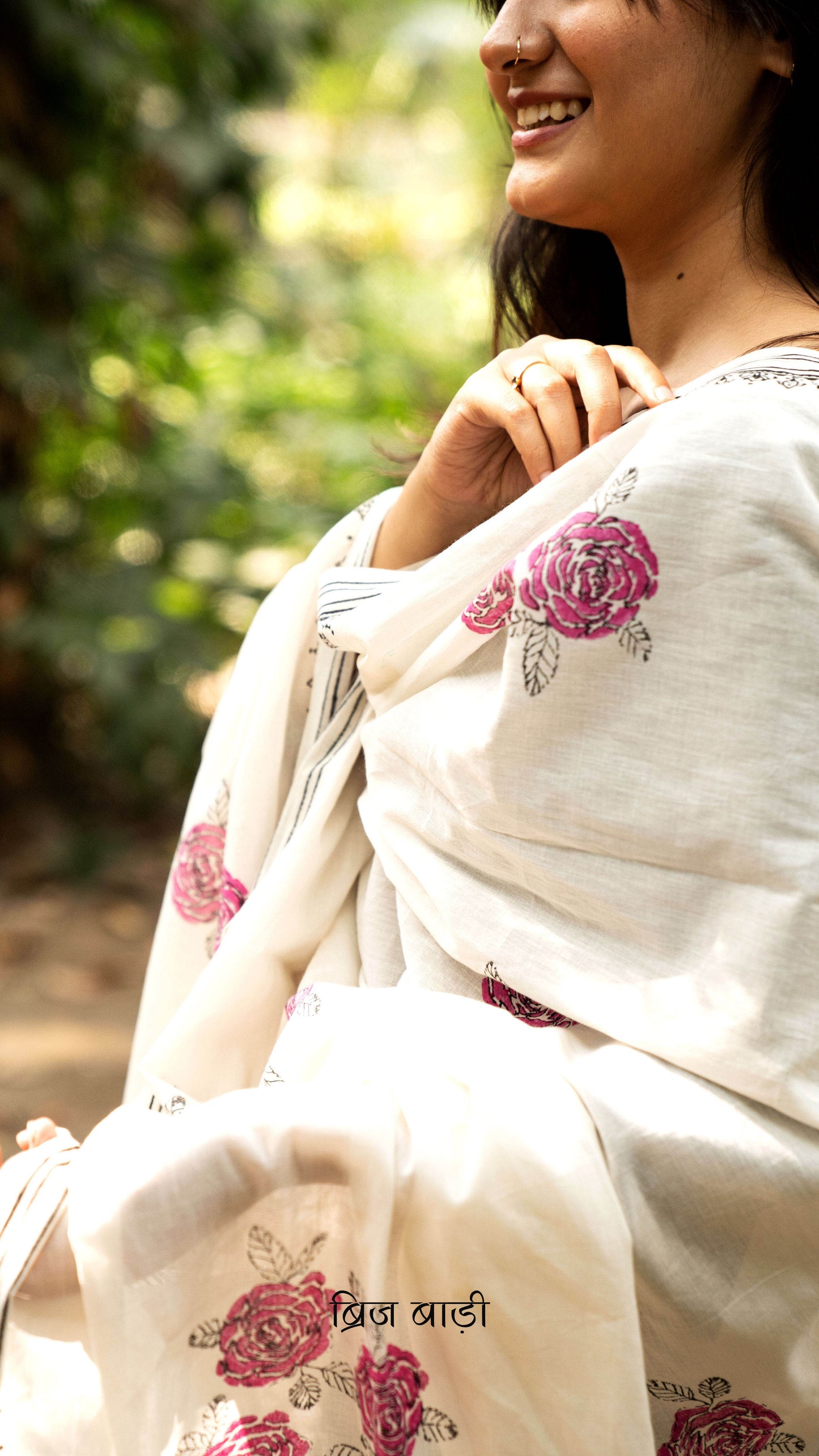 Off white soft and lightweight cotton dupatta by Brij Bari, hand block printed with charming floral motifs for an artisanal, handcrafted finish. Accented with light green handmade thread tassels on both ends of the pallu, this dupatta pairs beautifully with daily suits—adding an elegant touch and ensuring comfort for all-day wear. Free shipping pan India.