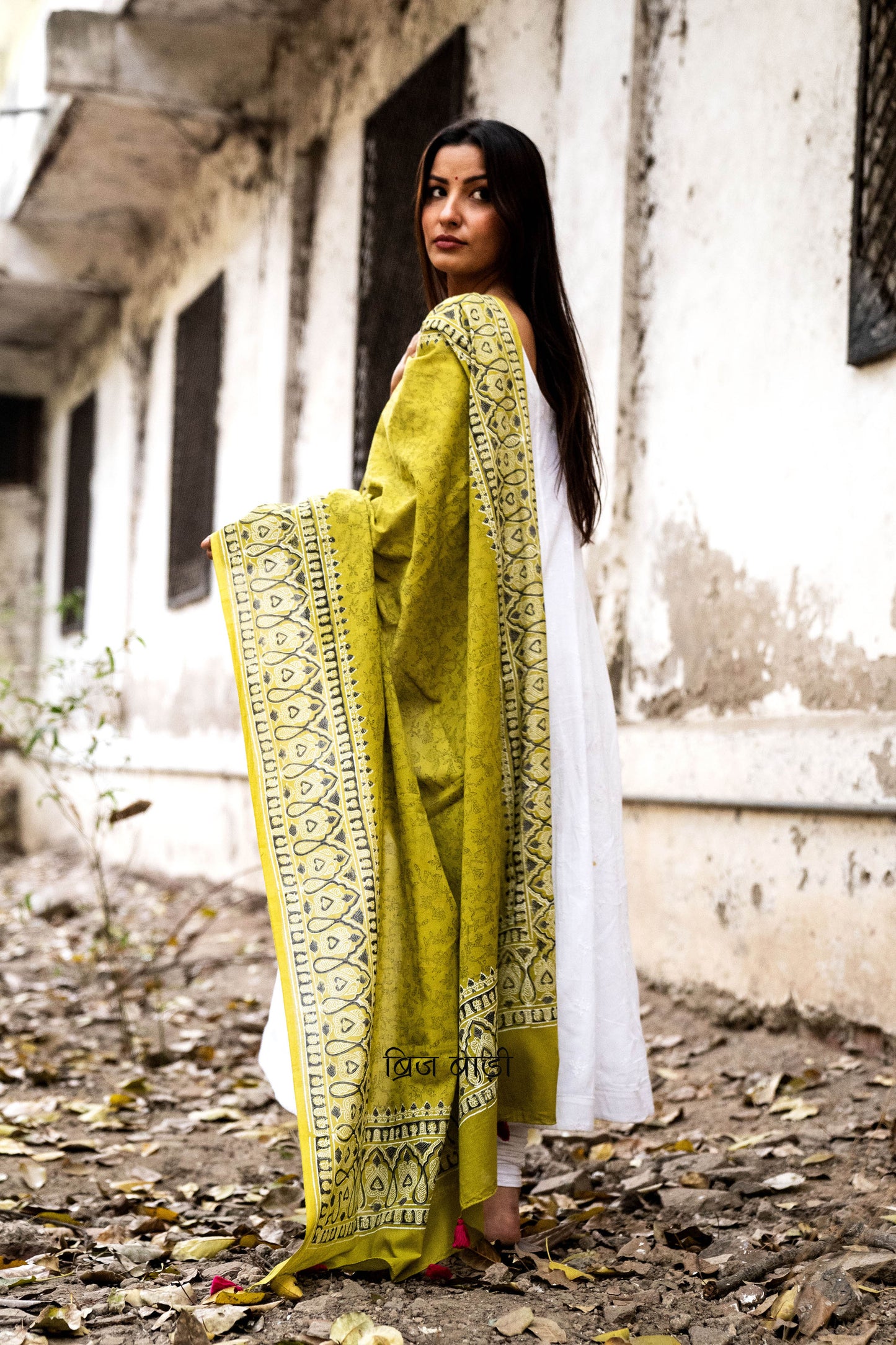 Light green soft and lightweight cotton dupatta by Brij Bari, hand block printed with delicate floral motifs, offering a beautifully handcrafted appeal. Finished with pink handmade thread tassels on both ends of the pallu, this dupatta effortlessly adds a pop of colour to your daily suits while ensuring breathable comfort and versatile style for all-day wear. Free shipping pan India.