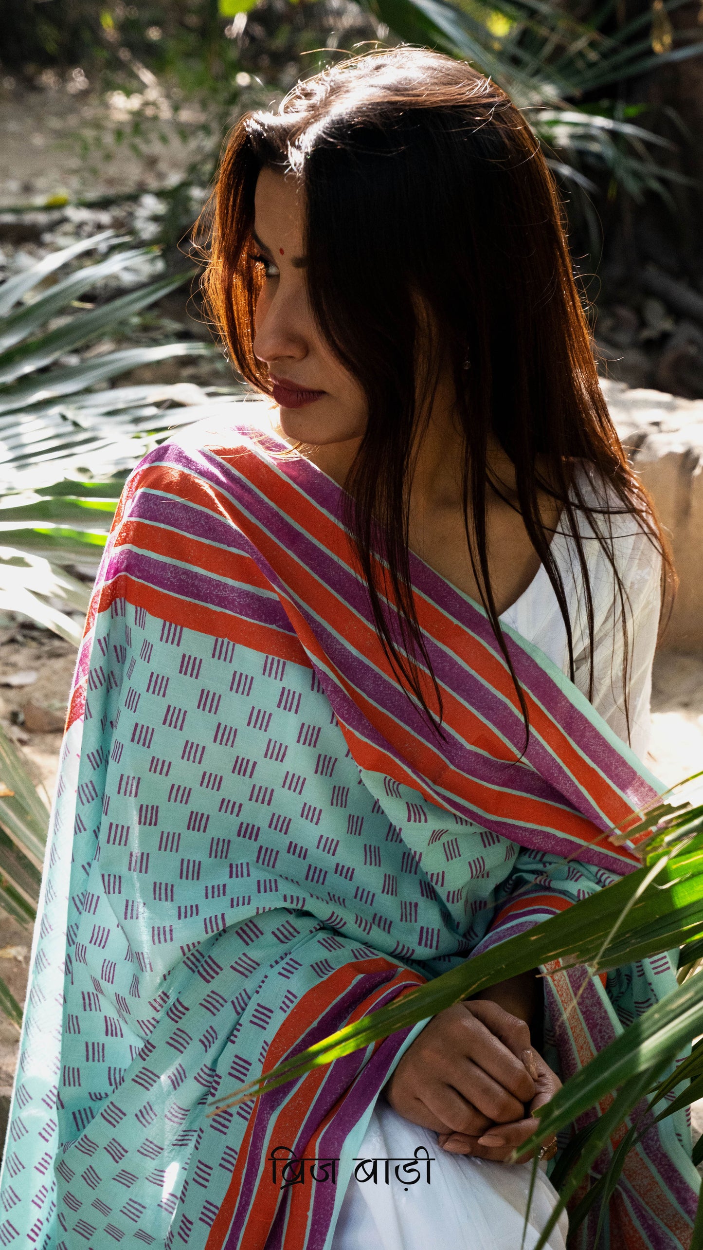 Light blue soft and lightweight cotton dupatta by Brij Bari, hand block printed with an elegant geometric pattern for a handcrafted, artisanal look. Enhanced with purple handmade thread tassels on both ends of the pallu, this dupatta is perfect to pair with everyday suits, adding a refreshing pop of colour and ensuring breathable comfort throughout the day. Free shipping pan India.