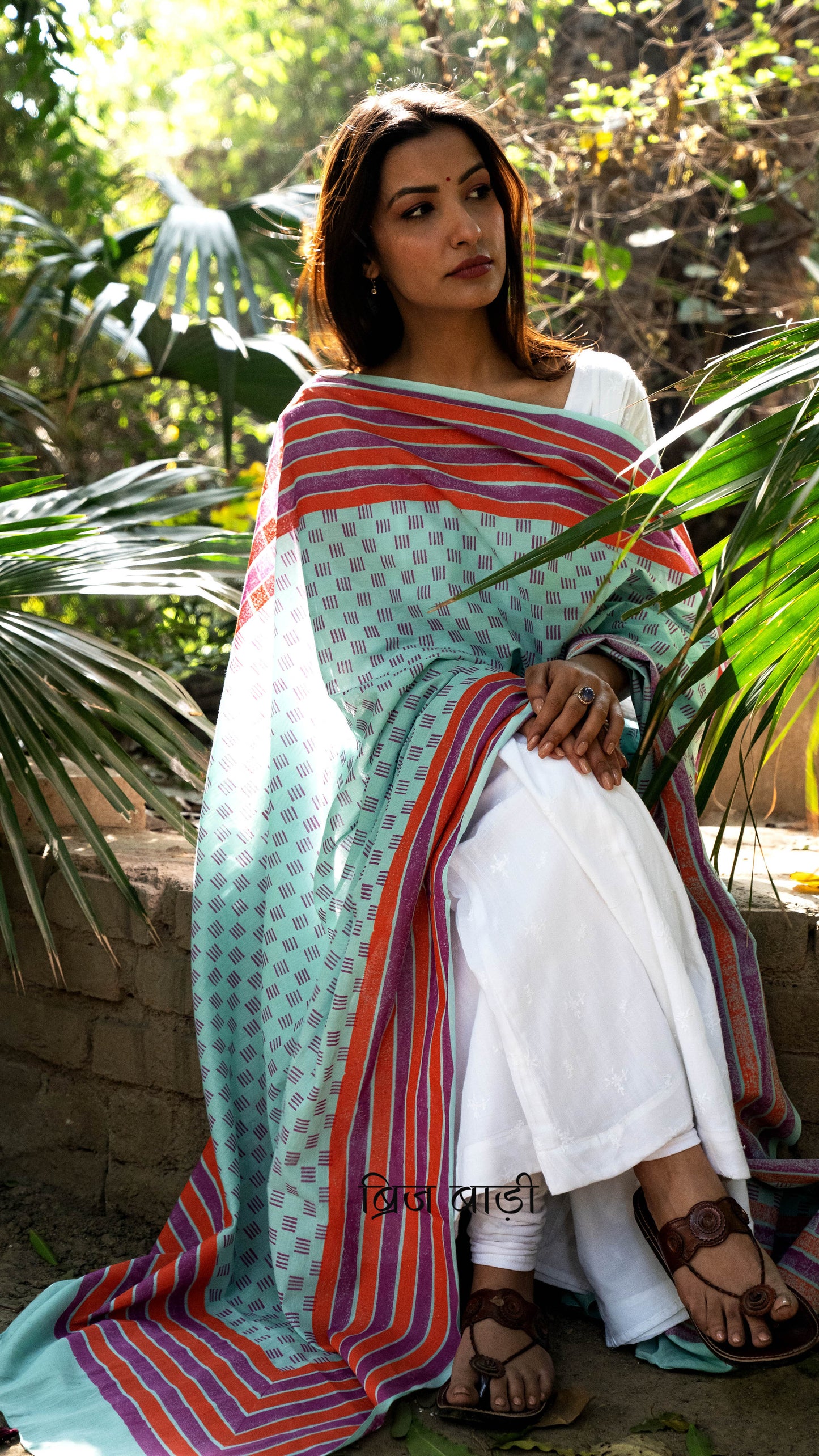 Light blue soft and lightweight cotton dupatta by Brij Bari, hand block printed with an elegant geometric pattern for a handcrafted, artisanal look. Enhanced with purple handmade thread tassels on both ends of the pallu, this dupatta is perfect to pair with everyday suits, adding a refreshing pop of colour and ensuring breathable comfort throughout the day. Free shipping pan India.