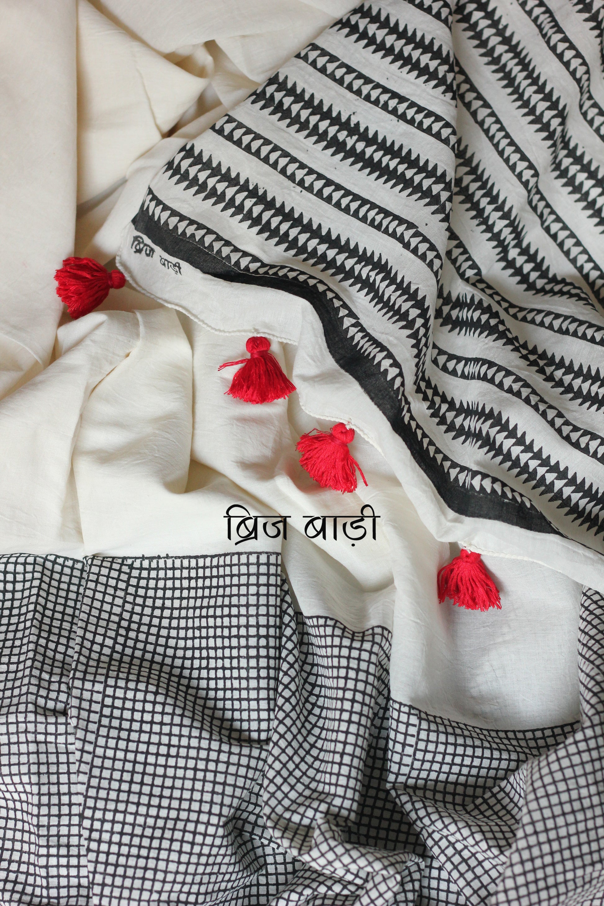 Handcrafted soft breezy stylish white cotton mulmul saree hand block printed by artisans of India. Free Shipping Pan India