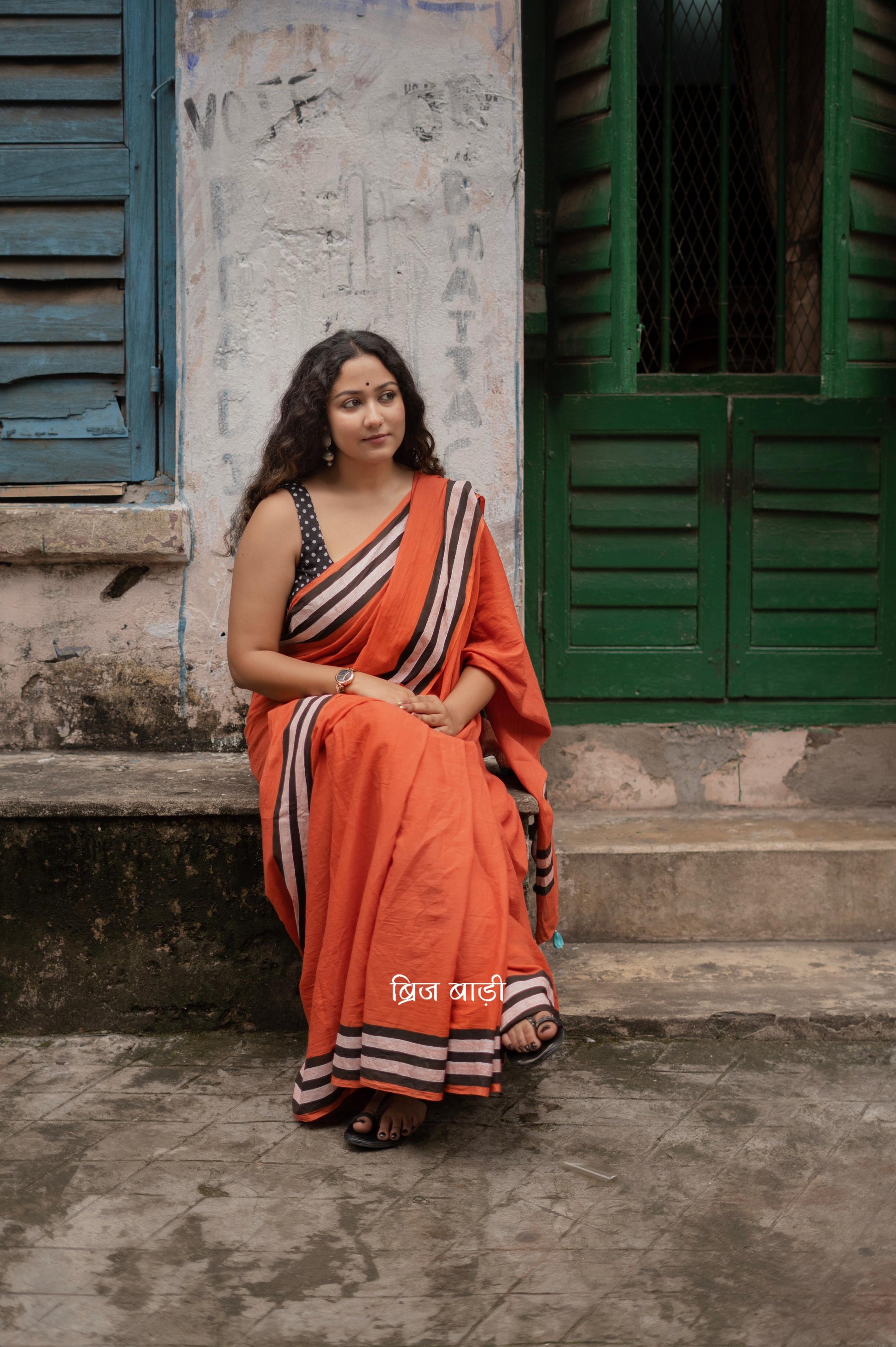 Rust soft cotton hand block printed saree with intricate design and contrast thread tassels, perfect for elegant and comfortable wear on any occasion.