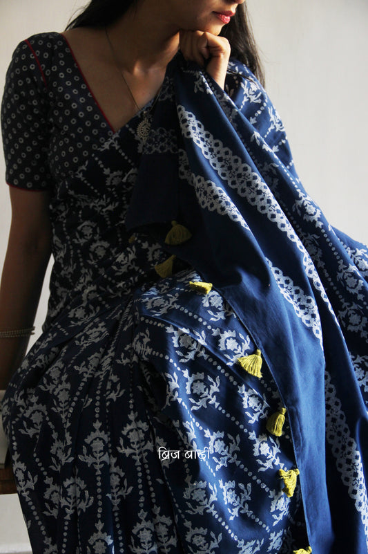 Blue hand block printed cotton saree with intricate motifs, lightweight and breathable fabric, includes a free matching blouse piece – perfect for everyday and festive wear.