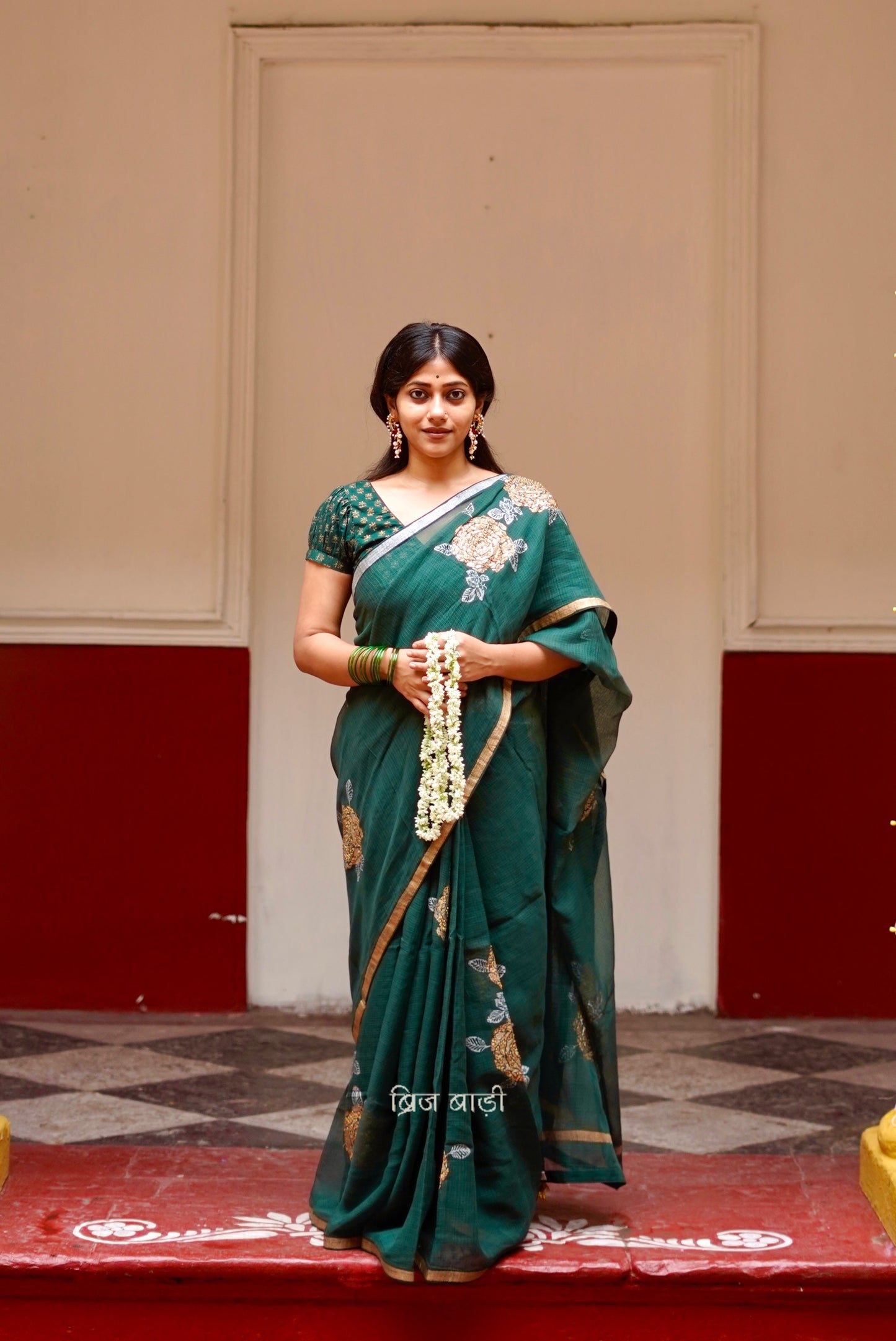 Palashini handloom handwoven Kota Doria saree with Hand block-printed floral motifs and embroidery with handmade thread tassel and ghungroo detailing on palla 