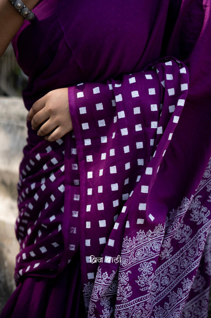 Purple soft cotton hand block printed saree with intricate patterns, offering a blend of elegance and comfort, perfect for both casual and festive occasions.