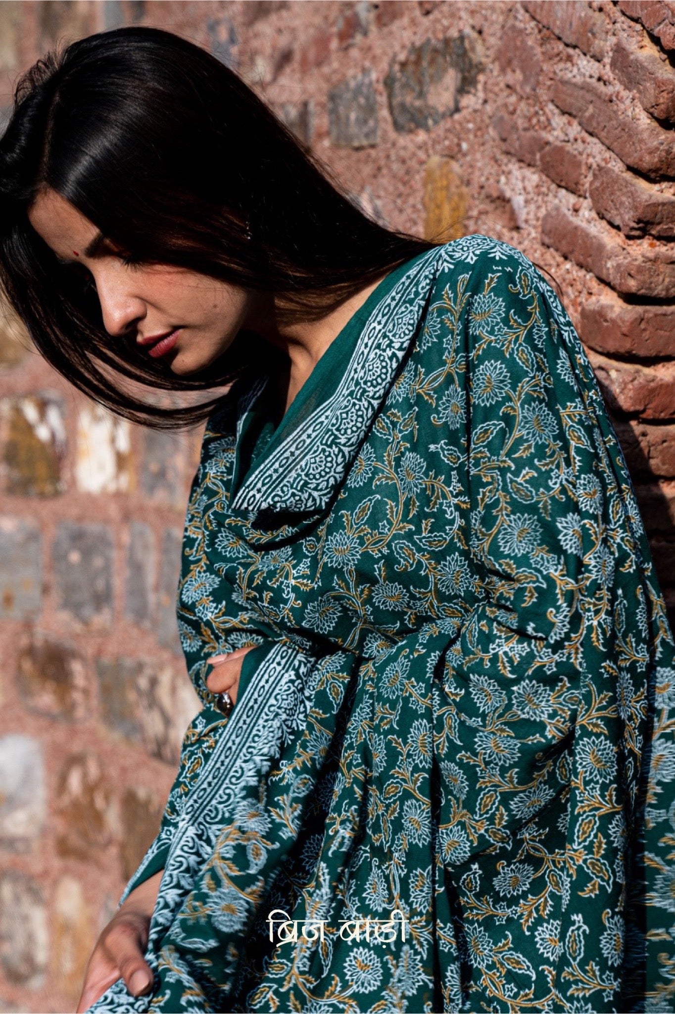 Dark green soft and lightweight cotton dupatta by Brij Bari, hand block printed with a beautiful floral pattern that brings out its artisanal charm. Finished with handcrafted mustard thread tassels on both ends of the pallu, this dupatta offers breathable comfort and a versatile look that pairs beautifully with everyday suits. Free shipping pan India.







