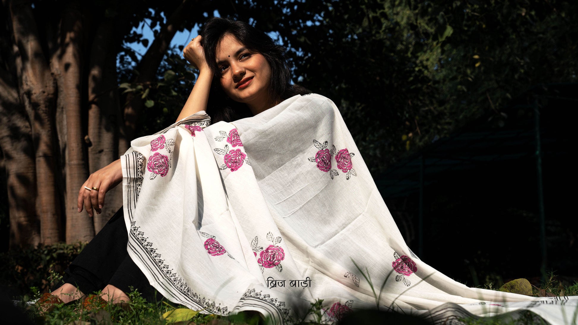 Off white soft and lightweight cotton dupatta by Brij Bari, hand block printed with charming floral motifs for an artisanal, handcrafted finish. Accented with light green handmade thread tassels on both ends of the pallu, this dupatta pairs beautifully with daily suits—adding an elegant touch and ensuring comfort for all-day wear. Free shipping pan India.