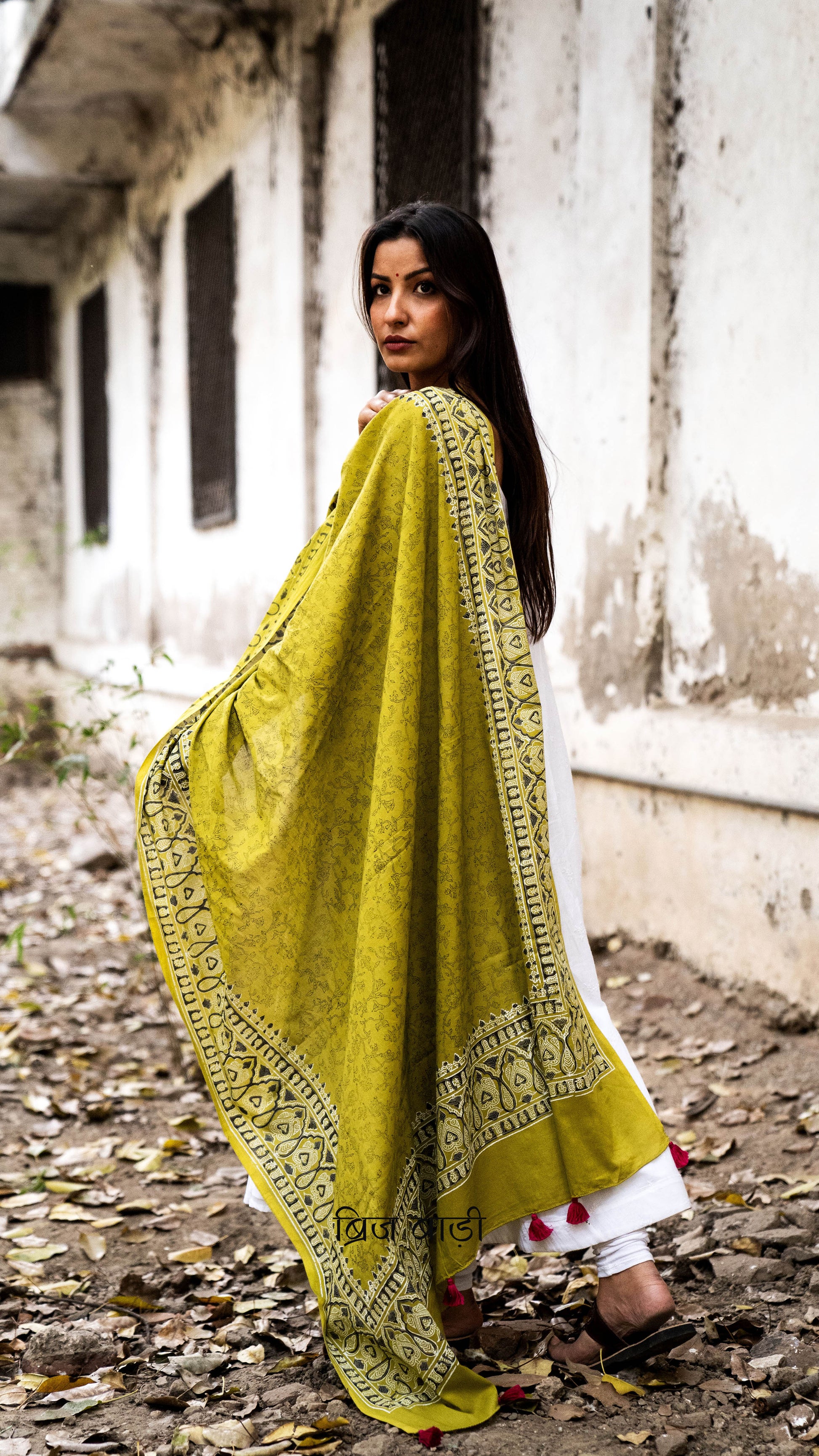 Light green soft and lightweight cotton dupatta by Brij Bari, hand block printed with delicate floral motifs, offering a beautifully handcrafted appeal. Finished with pink handmade thread tassels on both ends of the pallu, this dupatta effortlessly adds a pop of colour to your daily suits while ensuring breathable comfort and versatile style for all-day wear. Free shipping pan India.