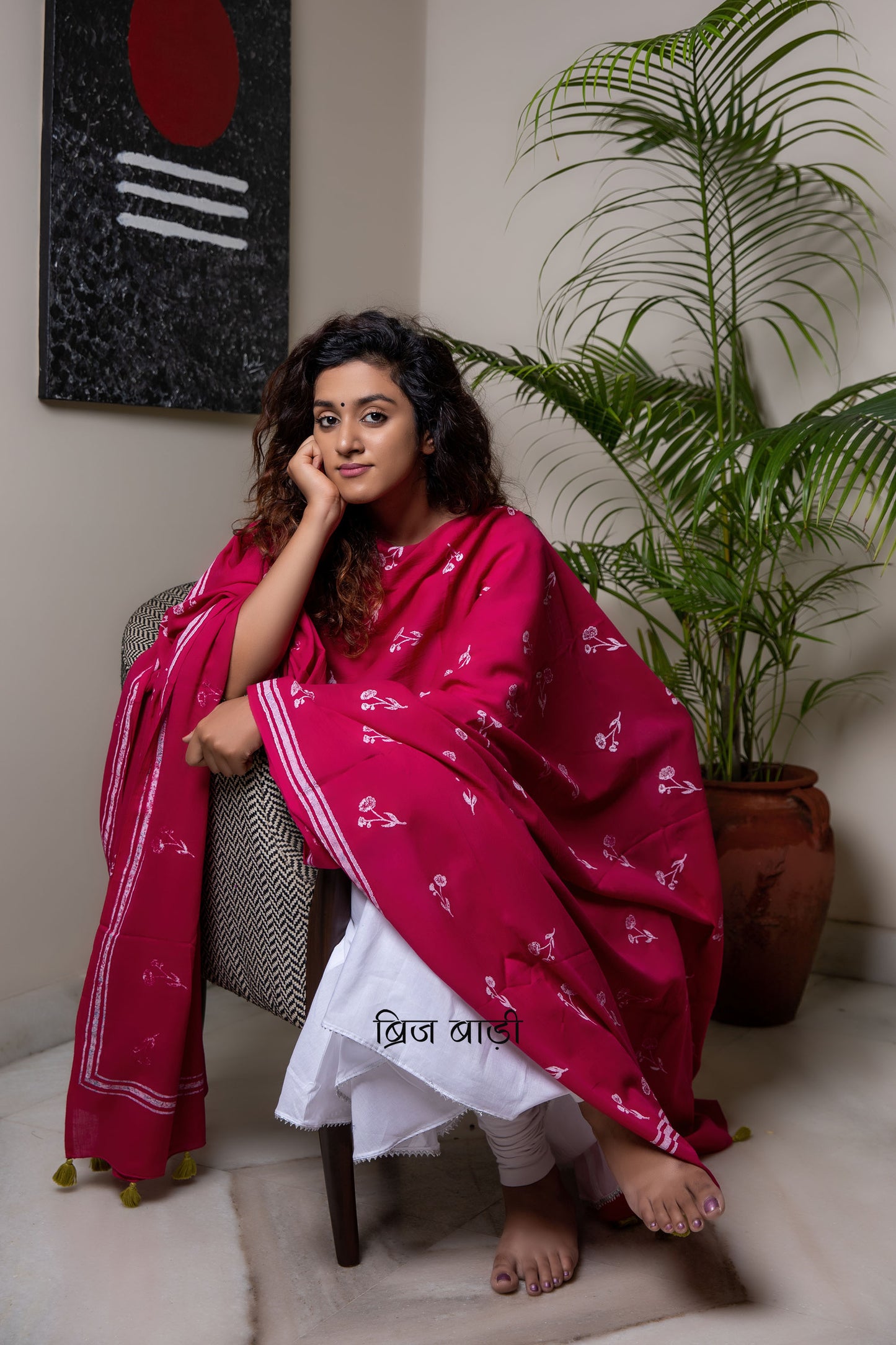 Pink soft and light-weight cotton dupatta by Brij Bari hand block printed with a delicate floral pattern creating a fresh and timeless look. Made from breathable, airy cotton fabric, this dupatta is perfect to pair with suits, kurtas, or casual ethnic outfits, adding an elegant handcrafted accent to your everyday or festive wear. The pallu is detailed with charming light green handmade thread tassels, adding a subtle pop of colour and artisanal finish. 